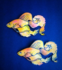 I stamped the fish on watercolour paper and cut them out.